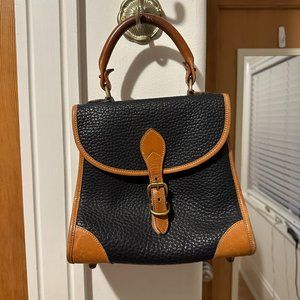 Black leather Dooney and Burke top handle bag
